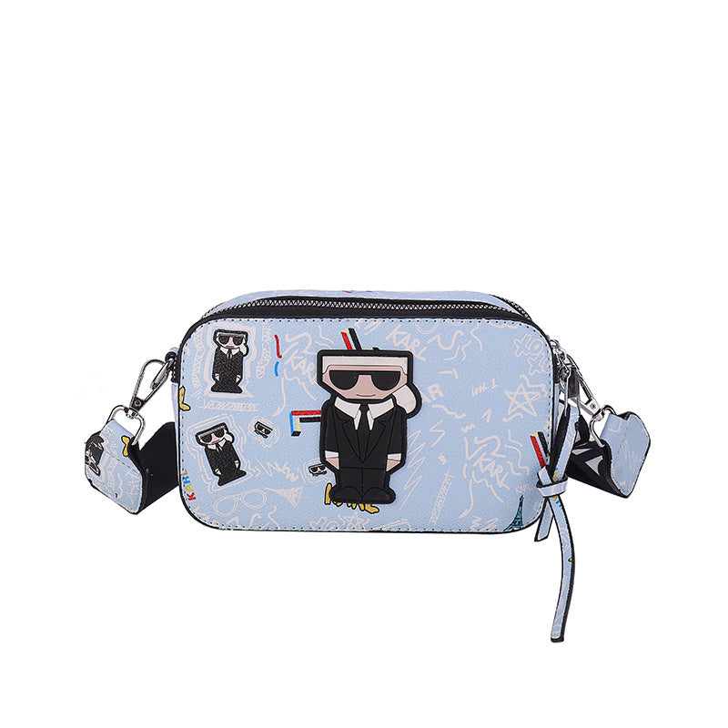 Light blue Unique Doodle Print PU Leather Bag - Lightweight Crossbody with Character - The Cool Collective AU