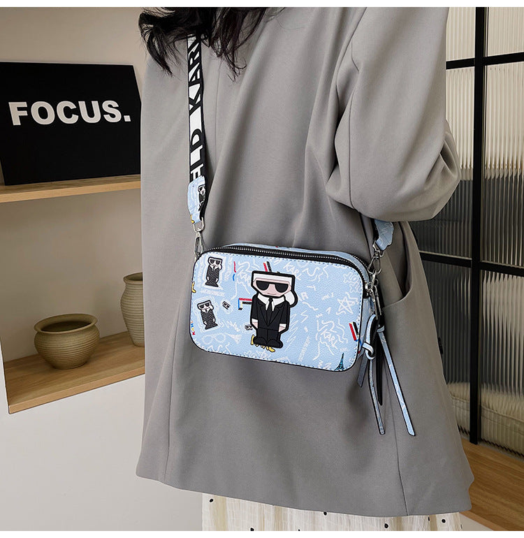 Light blue Unique Doodle Print PU Leather Bag - Lightweight Crossbody with Character - The Cool Collective AU